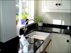 Image Of Absolute Black Granite Worktop With Grooved Drainer